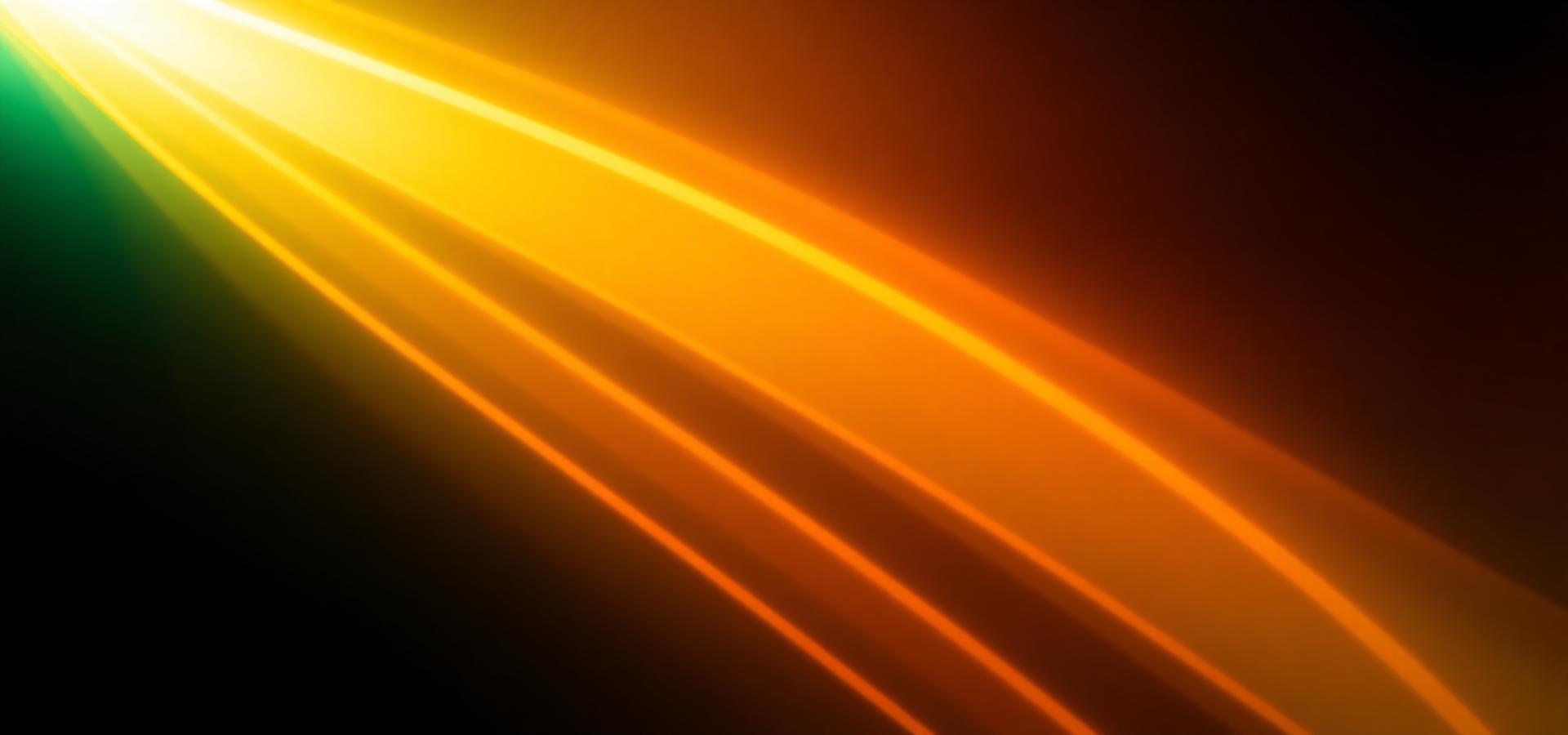 Warm orange light trails on a dark background